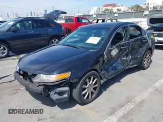 2007 Acura TSX with VIN JH4CL96847C002878, listed as a IAAI auction lot 42294047 with 230,745 mi miles and . Bid and sale history available at DreamBid. Image 2.