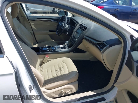 2013 Ford Fusion SE Hybrid with VIN 3FA6P0LU4DR337674, listed as a IAAI auction lot 42164262 with 150,902 mi miles and . Bid and sale history available at carsss.com. Image 5.