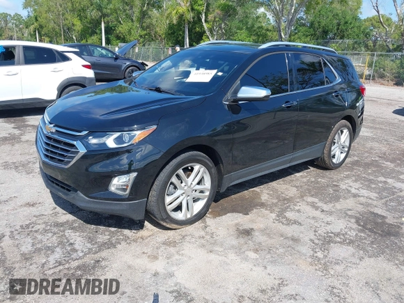 2018 Chevrolet Equinox Premier with VIN 2GNAXNEX1J6313528, listed as a IAAI auction lot 41938985 with 189,244 mi miles and . Bid and sale history available at DreamBid. Image 17.