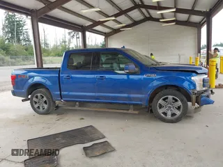 2018 Ford F-150 XL with VIN 1FTEW1EG5JFC68007, listed as a IAAI auction lot 42640571 with 148,394 mi miles and . Bid and sale history available at DreamBid. Image 13.
