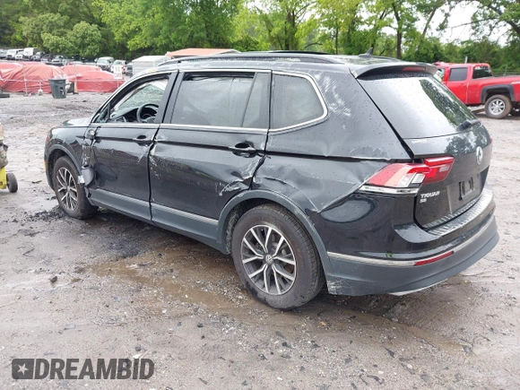 2021 Volkswagen Tiguan SE with VIN 3VV3B7AX6MM021502, listed as a IAAI auction lot 42243705 with 60,988 mi miles and . Bid and sale history available at DreamBid. Image 3.