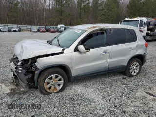 2010 Volkswagen Tiguan S with VIN WVGAV7AX6AW520952, listed as a Copart auction lot 47856855 with 119,822 mi miles and Salvage title. Bid and sale history available at DreamBid. Image 1.