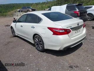 2016 Nissan Altima SR with VIN 1N4AL3AP9GC136005, listed as a IAAI auction lot 42041717 with 136,594 mi miles and . Bid and sale history available at DreamBid. Image 3.