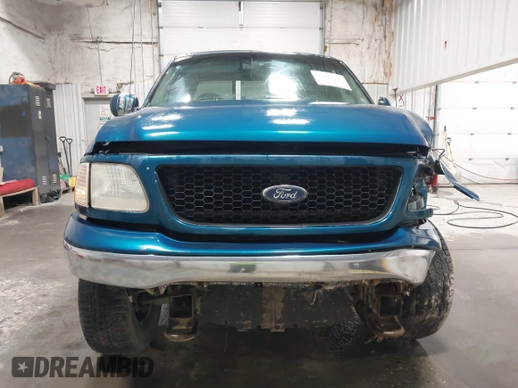 2000 Ford F-150 XL z VIN 1FTRX18L7YKB27657, wystawiony jako IAAI lot #42262373 z przebiegiem Nie podano mil oraz . Historia ofert i sprzedaży dostępna na DreamBid. Obrazek 12.