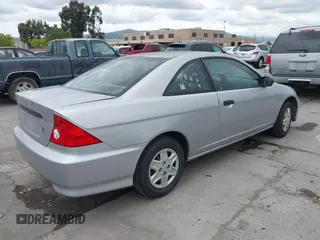 2005 Honda Civic Cpe VP with VIN 1HGEM21105L058145, listed as a IAAI auction lot 42137371 with 207,361 mi miles. Bid and sale history available at carsss.com. Image 4.