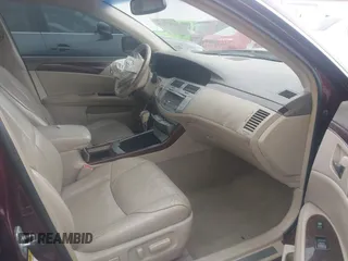 2008 Toyota Avalon XL with VIN 4T1BK36B78U259677, listed as a IAAI auction lot 41977275 with 246,736 mi miles. Bid and sale history available at carsss.com. Image 5.