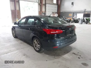 2018 Ford Focus SE with VIN 1FADP3FE8JL209560, listed as a IAAI auction lot 42707236 with 166,017 mi miles and . Bid and sale history available at DreamBid. Image 3.
