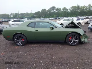 2018 Dodge Challenger SXT Plus z VIN 2C3CDZAG6JH339588, wystawiony jako IAAI lot #42441517 z przebiegiem 66 921 mil mil oraz . Historia ofert i sprzedaży dostępna na DreamBid. Obrazek 13.
