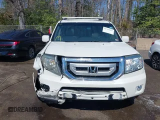 2011 Honda Pilot Touring with VIN 5FNYF4H96BB014095, listed as a IAAI auction lot 41794052 with 202,440 mi miles and . Bid and sale history available at DreamBid. Image 12.