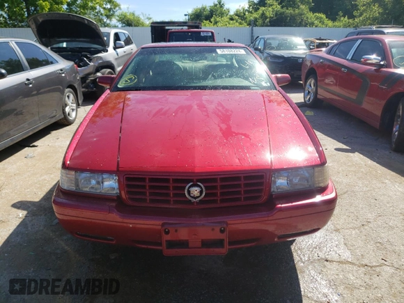 2000 Cadillac Eldorado Touring ETC z VIN 1G6ET129XYU191433, wystawiony jako Copart lot #58108224 z przebiegiem 76 957 mil mil oraz Szkody całkowita. Historia ofert i sprzedaży dostępna na DreamBid. Obrazek 5.
