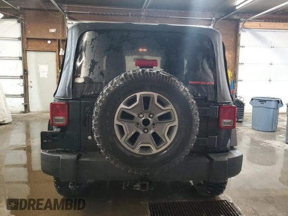 2014 Jeep Wrangler Sport with VIN 1C4AJWAG5EL307945, listed as a Copart auction lot 60152035 with 119,508 mi miles and Salvage title. Bid and sale history available at DreamBid. Image 6.