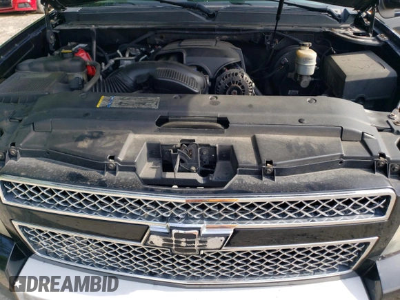 2011 Chevrolet Suburban LT z VIN 1GNSKJE31BR148448, wystawiony jako Copart lot #61057955 z przebiegiem 237 656 mil mil oraz Czysty tytuł • Clean title. Historia ofert i sprzedaży dostępna na DreamBid. Obrazek 11.