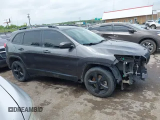 2018 Jeep Cherokee Latitude with VIN 1C4PJLCB2JD595549, listed as a IAAI auction lot 42132845 with 139,819 mi miles and . Bid and sale history available at DreamBid. Image 13.
