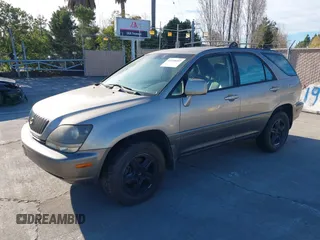 1999 Lexus RX 300 Luxury SUV with VIN JT6HF10UXX0055700, listed as a IAAI auction lot 41330497 with 203,087 mi miles. Bid and sale history available at carsss.com. Image 2.