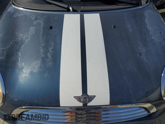 2009 MINI Convertible with VIN WMWMR33559TU96728, listed as a Copart auction lot 77949004 with 86,084 mi miles and Clean title. Bid and sale history available at DreamBid. Image 11.