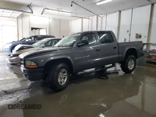 2002 Dodge Dakota Sport z VIN 1B7HG38N02S585511, wystawiony jako Copart lot #57072345 z przebiegiem 266 306 mil mil oraz Szkoda całkowita • Salvage title. Historia ofert i sprzedaży dostępna na DreamBid. Obrazek 1.