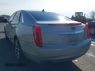 2013 Cadillac XTS Luxury z VIN 2G61R5S31D9185009, wystawiony jako IAAI lot #41243001 z przebiegiem 161 219 mil mil oraz . Historia ofert i sprzedaży dostępna na DreamBid. Obrazek 3.