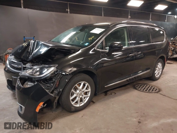 2020 Chrysler Pacifica Touring L with VIN 2C4RC1BG2LR280156, listed as a IAAI auction lot 42182406 with 105,038 mi miles and . Bid and sale history available at DreamBid. Image 2.