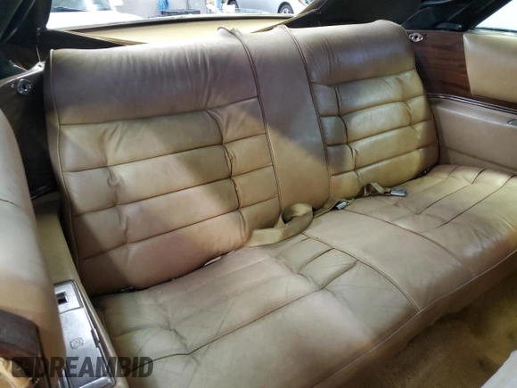 1976 Cadillac Eldorado z VIN 6L67S6Q235270, wystawiony jako Copart lot #80518554 z przebiegiem 4 944 mil mil oraz Szkoda całkowita • Salvage title. Historia ofert i sprzedaży dostępna na DreamBid. Obrazek 10.