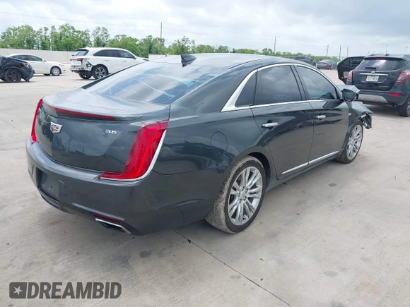 2019 Cadillac XTS Luxury with VIN 2G61M5S33K9113899, listed as a IAAI auction lot 42063952 with 148,773 mi miles and . Bid and sale history available at DreamBid. Image 4.