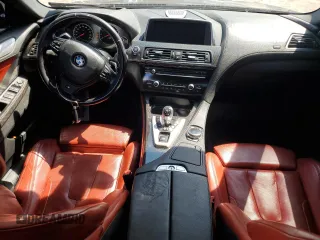 2015 BMW M6 z VIN WBS6C9C50FD467779, wystawiony jako Copart lot #56702794 z przebiegiem 78 259 mil mil oraz Szkody całkowita. Historia ofert i sprzedaży dostępna na DreamBid. Obrazek 8.