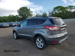 2014 Ford Escape SE z VIN 1FMCU9GX3EUE26446, wystawiony jako Copart lot #57113865 z przebiegiem 145 699 mil mil oraz Szkoda całkowita • Salvage title. Historia ofert i sprzedaży dostępna na DreamBid. Obrazek 2.