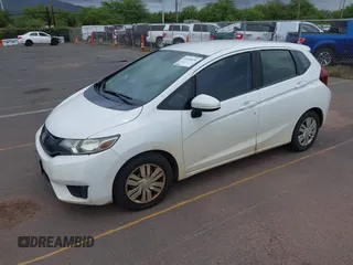 2016 Honda Fit LX z VIN JHMGK5H51GX038519, wystawiony jako IAAI lot #41809636 z przebiegiem 96 894 mil mil oraz . Historia ofert i sprzedaży dostępna na DreamBid. Obrazek 2.