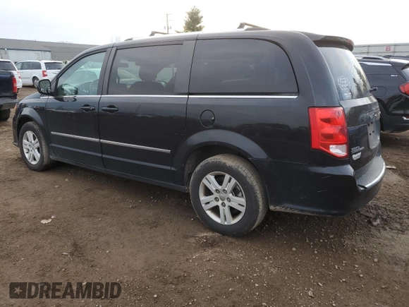 2017 Dodge Grand Caravan Crew Plus with VIN 2C4RDGDG6HR687014, listed as a Copart auction lot 82106924 with 115,255 mi miles and Clean Title. Bid and sale history available at DreamBid. Image 2.