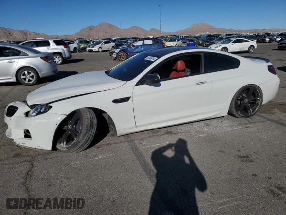 2015 BMW M6 z VIN WBSLX9C54FD160753, wystawiony jako Copart lot #83486484 z przebiegiem 80 275 mil mil oraz Szkody całkowita. Historia ofert i sprzedaży dostępna na DreamBid. Obrazek 1.