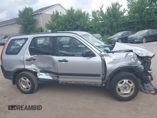 2002 Honda CR-V LX z VIN JHLRD78562C081322, wystawiony jako IAAI lot #42452985 z przebiegiem 193 011 mil mil oraz . Historia ofert i sprzedaży dostępna na DreamBid. Obrazek 14.