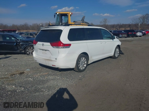 2013 Toyota Sienna LE with VIN 5TDJK3DC0DS066829, listed as a IAAI auction lot 41635076 with 205,808 mi miles and . Bid and sale history available at DreamBid. Image 4.