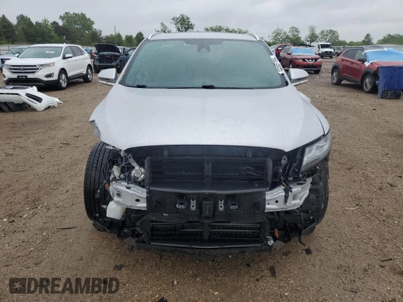 2019 Lincoln MKC Reserve with VIN 5LMCJ3D95KUL22724, listed as a Copart auction lot 56861795 with 59,275 mi miles and Salvage title. Bid and sale history available at DreamBid. Image 5.