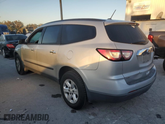 2013 Chevrolet Traverse LS with VIN 1GNKVFED9DJ124042, listed as a Copart auction lot 83077294 with 102,812 mi miles and Salvage Title. Bid and sale history available at DreamBid. Image 2.