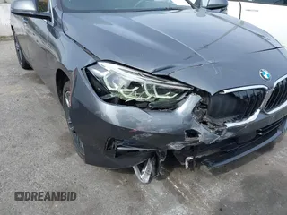 2021 BMW 2 Series 228i with VIN WBA53AK03M7J11216, listed as a IAAI auction lot 41688822 with 22,367 mi miles and . Bid and sale history available at carsss.com. Image 6.