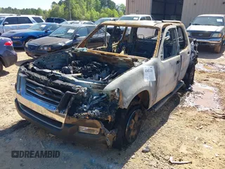 2007 Ford Explorer Sport Trac XLT z VIN 1FMEU31K57UA06242, wystawiony jako IAAI lot #42002420 z przebiegiem Nie podano mil oraz . Historia ofert i sprzedaży dostępna na DreamBid. Obrazek 2.