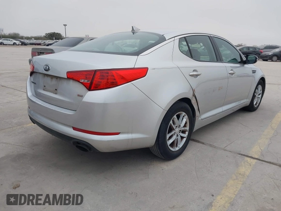 2013 Kia Optima LX with VIN KNAGM4A79D5377485, listed as a IAAI auction lot 41290306 with 172,253 mi miles. Bid and sale history available at carsss.com. Image 4.