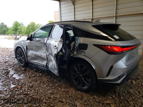 2023 Lexus RX with VIN 2T2BAMCA7PC006617, listed as a Copart auction lot 63706013 with 6,772 mi miles. Bid and sale history available at carsss.com. Image 2.