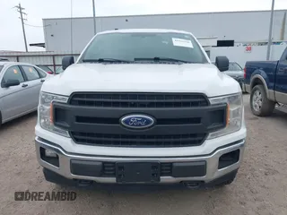 2018 Ford F-150 XL with VIN 1FTFW1E58JKE22834, listed as a IAAI auction lot 41923960 with 214,459 mi miles. Bid and sale history available at carsss.com. Image 13.