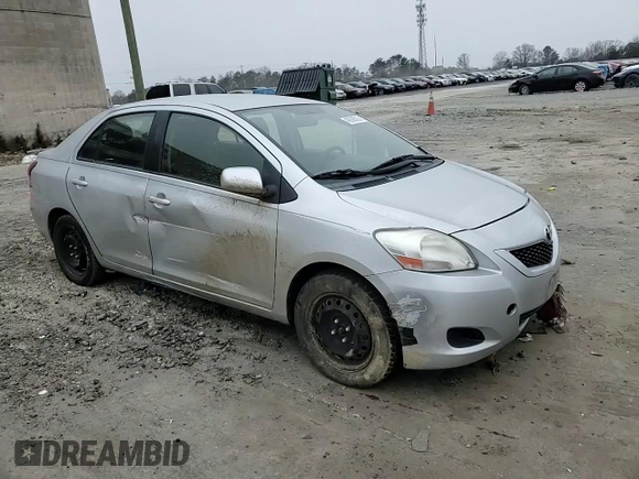 2012 Toyota Yaris with VIN JTDBT4K35CL037319, listed as a Copart auction lot 46098585 with 126,039 mi miles and Salvage Title. Bid and sale history available at DreamBid. Image 10.