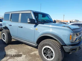 2024 Ford Bronco Badlands z VIN 1FMEE9BP2RLA26774, wystawiony jako IAAI lot #41756285 z przebiegiem 5875 mil mil oraz . Historia ofert i sprzedaży dostępna na DreamBid. Obrazek 1.