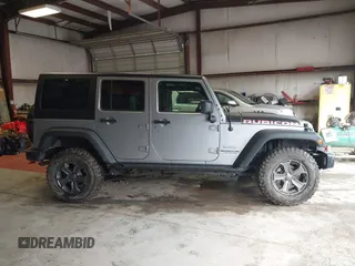 2017 Jeep Wrangler Unlimited Rubicon Recon z VIN 1C4BJWFG5HL687757, wystawiony jako IAAI lot #42367095 z przebiegiem 48 441 mil mil oraz . Historia ofert i sprzedaży dostępna na DreamBid. Obrazek 13.