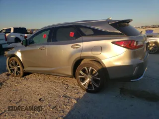 2021 Lexus RX 350L z VIN JTJHZKEA0M2019757, wystawiony jako Copart lot #71006144 z przebiegiem Nie podano mil oraz Szkoda całkowita • Salvage title. Historia ofert i sprzedaży dostępna na DreamBid. Obrazek 2.