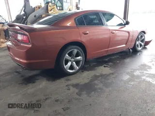 2013 Dodge Charger RT with VIN 2C3CDXCT5DH605945, listed as a IAAI auction lot 41958140 with 84,049 mi miles. Bid and sale history available at carsss.com. Image 4.