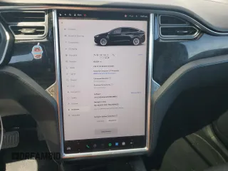 2017 Tesla Model X 90D with VIN 5YJXCBE20HF051099, listed as a Copart auction lot 52208205 with 118,828 mi miles and Salvage Title. Bid and sale history available at DreamBid. Image 9.