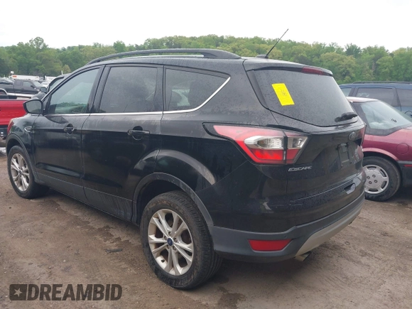 2017 Ford Escape SE with VIN 1FMCU9GD6HUB90367, listed as a IAAI auction lot 42088930 with 145,286 mi miles and . Bid and sale history available at DreamBid. Image 3.