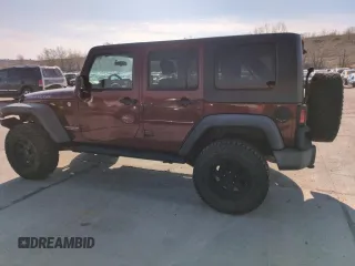 2010 Jeep Wrangler Unlimited Rubicon with VIN 1J4BA6H13AL140902, listed as a Copart auction lot 54335455 with 118,423 mi miles and Clean title. Bid and sale history available at DreamBid. Image 2.