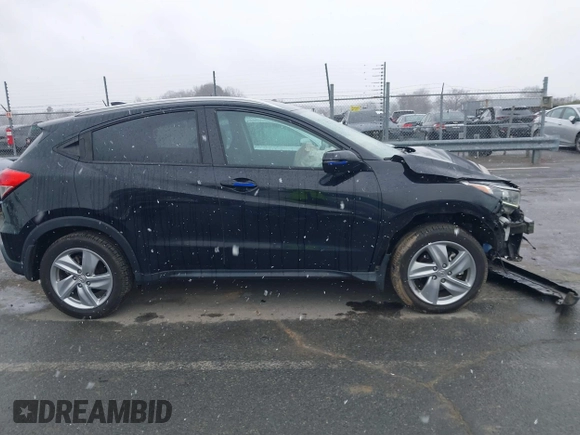 2019 Honda HR-V EX with VIN 3CZRU5H52KM704011, listed as a IAAI auction lot 41616517 with 57,921 mi miles. Bid and sale history available at carsss.com. Image 13.