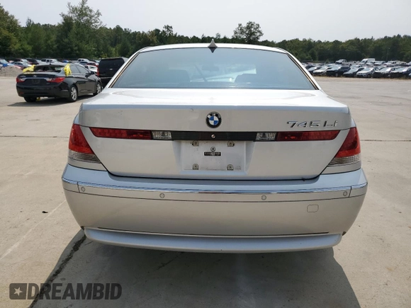 2004 BMW 7 Series 745Li with VIN WBAGN63444DS47664, listed as a Copart auction lot 71046044 with 144,598 mi miles and Salvage title. Bid and sale history available at DreamBid. Image 6.
