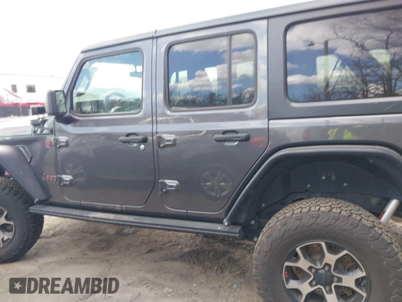 2018 Jeep Wrangler Unlimited Rubicon with VIN 1C4HJXFG8JW111195, listed as a IAAI auction lot 41916718 with 190,158 mi miles and . Bid and sale history available at DreamBid. Image 14.