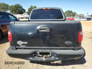 2002 Ford F-150 Harley Davidson with VIN 1FTRW07332KD46296, listed as a Copart auction lot 76333404 with 160,616 mi miles and Salvage Title. Bid and sale history available at carsss.com. Image 6.